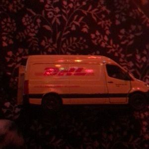 Yellow DhL Toy car model
